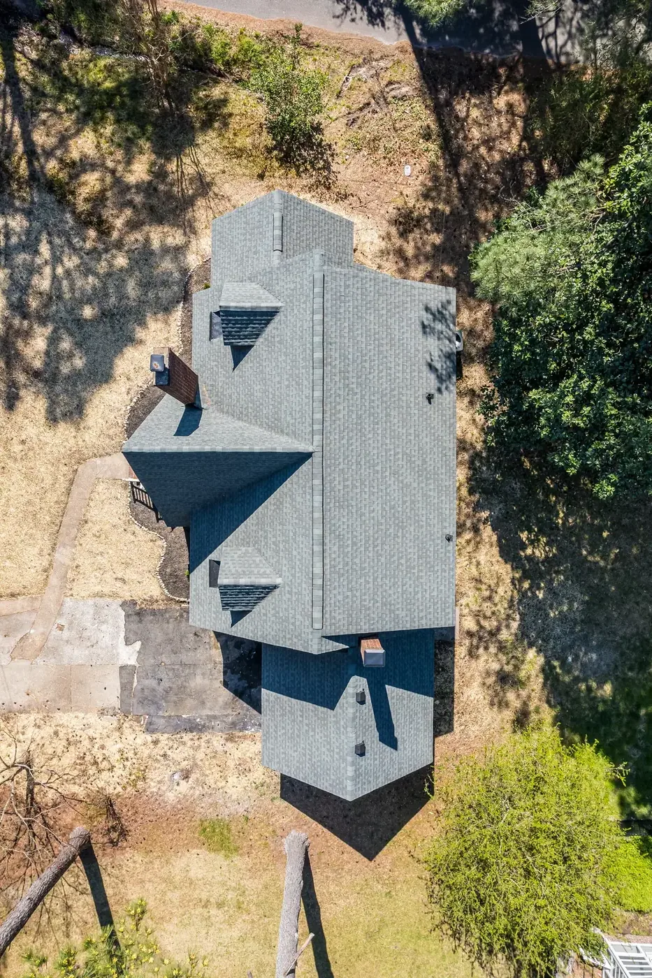 Aerial view of a home showing new roof planes and structural expansion