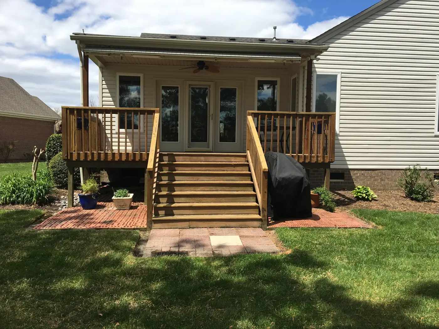 Rear deck and stair addition with lower patio and grilling area